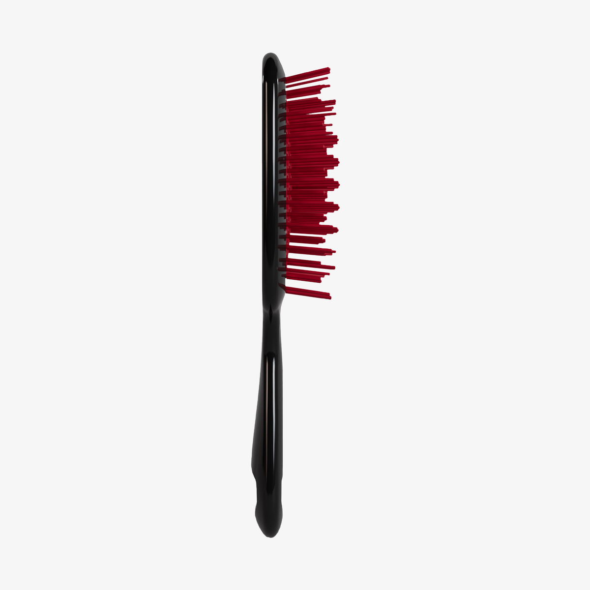 Die UNbrush Detangling Hair Brush in Schwarz mit roten Borsten ist im Profil vor einem schlichten weißen Hintergrund abgebildet.
