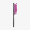 UNbrush Detangling-Haarbürste in Grau mit rosa Borsten, dargestellt auf weißem Hintergrund.