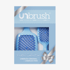 Das UNbrush Pastel Duo Set besteht aus zwei Haarbürsten in einer pastellfarbenen Verpackung mit einem silbernen Band und einem Etikett "Pastel Collection" auf der Schachtel.