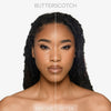 Vorher-Nachher-Bild des Gesichts einer Frau nach Anwendung des BPerfect Cosmetics x Katie Daley Perfect Powders Butterscotch.