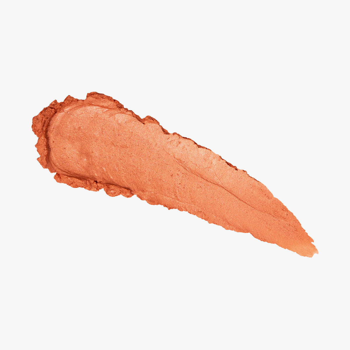 Ein orange-schimmernder Farbstreifen Yummy Skin Blurring Balm Powder Lowlighter Lowkey auf weißem Hintergrund.
