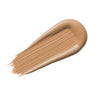 Beige Farbstreifen des Yummy Skin Serum Tint in der Shade 6.5 auf weißem Hintergrund.
