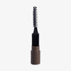 Schwarzer Spoolie-Pinsel-Applikator des Dominique Brow Frame Pencil ist auf weißem Hintergrund abgebildet.
