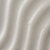 Nahaufnahme der glatten, weißen, cremigen Textur des ClariCleanse AHA & BHA Exfoliating Cleanser.