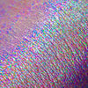 Nahaufnahme des seidigen Opal Shadow Potion Silky Gel Eyeshadow Velvet Dreams; lila und opal schimmernd auf der Haut.