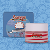 Blaue Verapckung der Adventure Time Peppermint Butler Lip Mask mit Abbildung des Peppermint Butler neben Tiegel des Produkts.