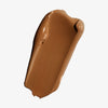 Warmbrauner Farbstreifen des Lumene INVISIBLE ILLUMINATION Instant Glow Fresh Skin Tint in der Farbe Universal Deep.