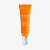 Orange Tube Lumene NORDIC-C [VALO] Glow Boost Eye Serum mit einem silbernen Roller-Applikator.