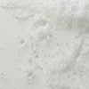 Nahaufnahme einer schaumigen, klaren Reinigungs-Textur mit feinen Bläschen – vermutlich ein schäumender Gesichtsreiniger oder Cleanser.