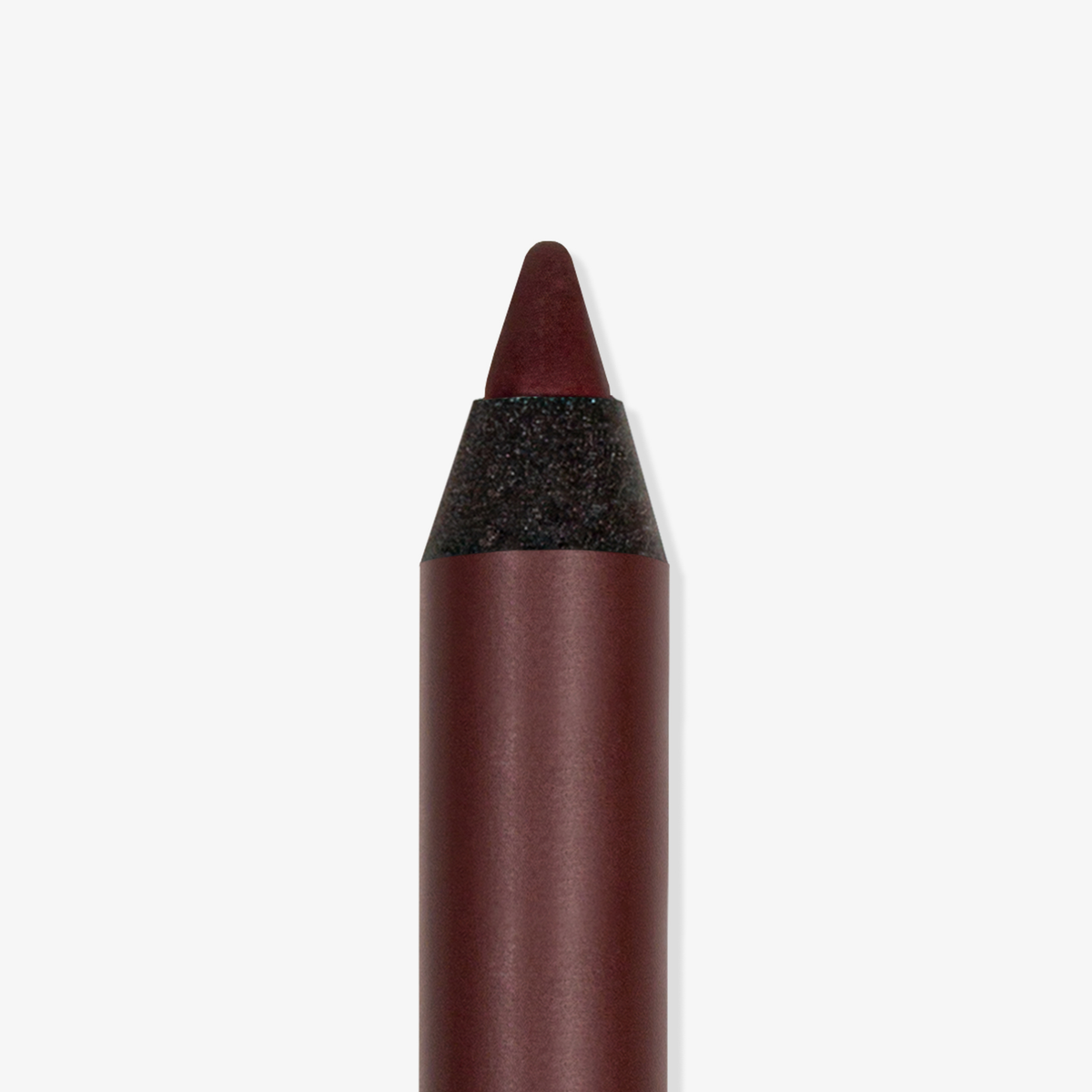 Eine Nahaufnahme des braunen Make-up-Stifts THE GLAM FEMULINE von Mesauda Beauty mit spitzer Spitze auf weißem Hintergrund.