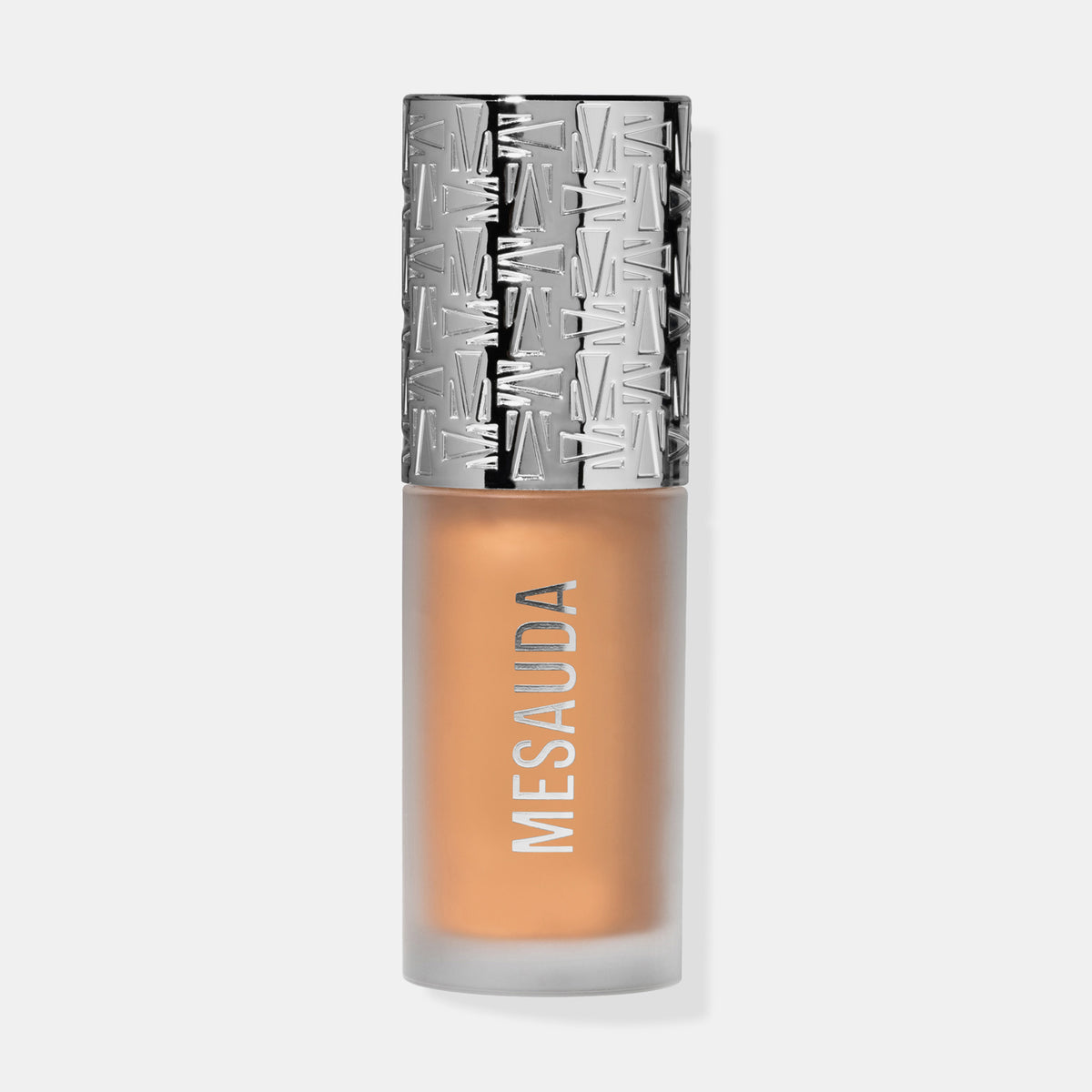 Die Flasche Flush of Light Sunset Bronze von Mesauda mit silbergemustertem Deckel und warm-goldenem Inhalt.