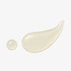 Ein cremiger perlfarbener Klecks und ein kleiner runder Tropfen Madagascar Centella Light Cleansing Oil auf weißem Hintergrund.