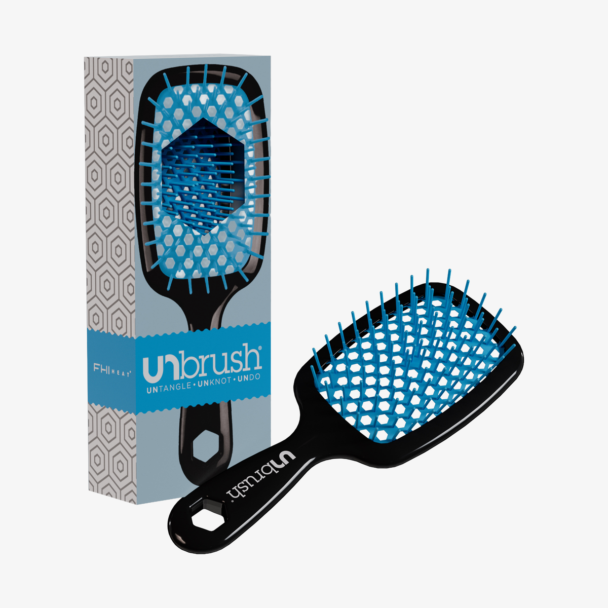 Eine schwarz-blaue UNbrush Detangling Hair Brush mit blauen Borsten neben ihrer gemusterten Schachtel.