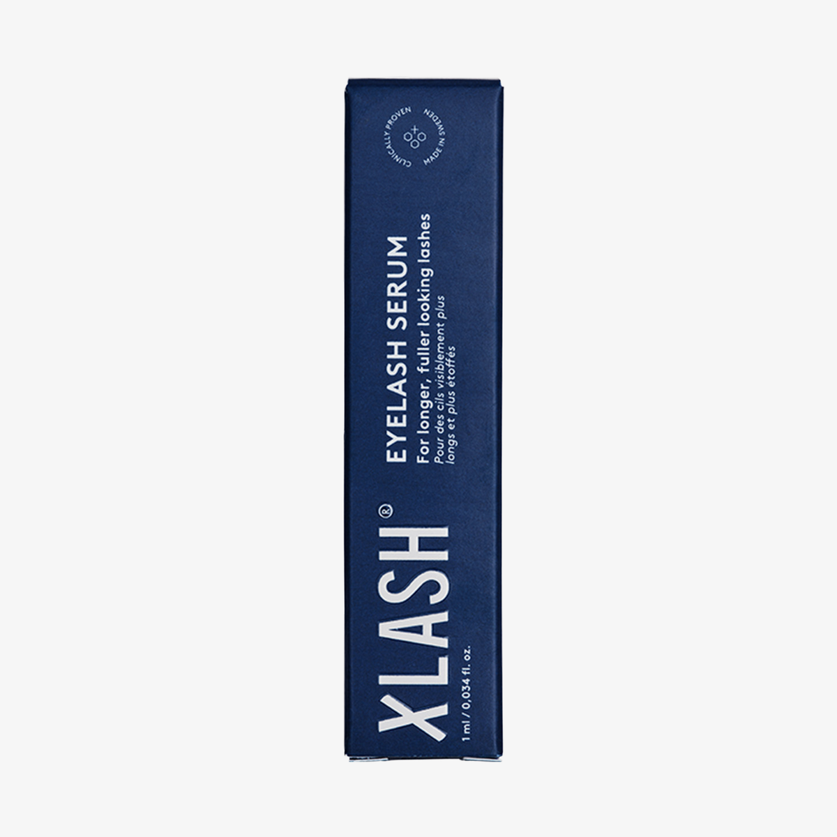 XLASH Xlash Wimpernserum – 1 ml, für optisch längere Wimpern, aufrecht stehend in einer blauen Schachtel auf weißem Hintergrund abgebildet.