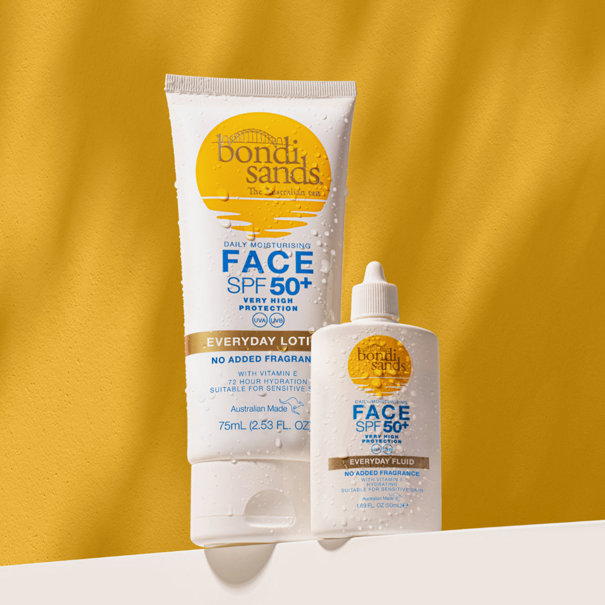 Zwei Bondi Sands SPF 50+ Everyday Face Lotions vor gelbem Hintergrund.