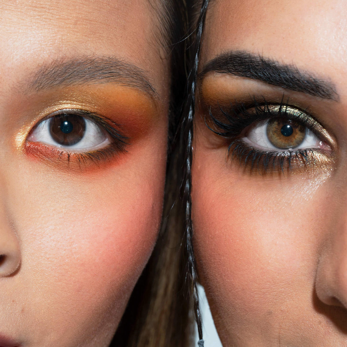 Zwei Gesichter nebeneinander mit kräftigem, farbenfrohem Augen-Make-up in Gold-, Orange- und Rottönen, kreiert mit der LH Cosmetics Creator Palette.