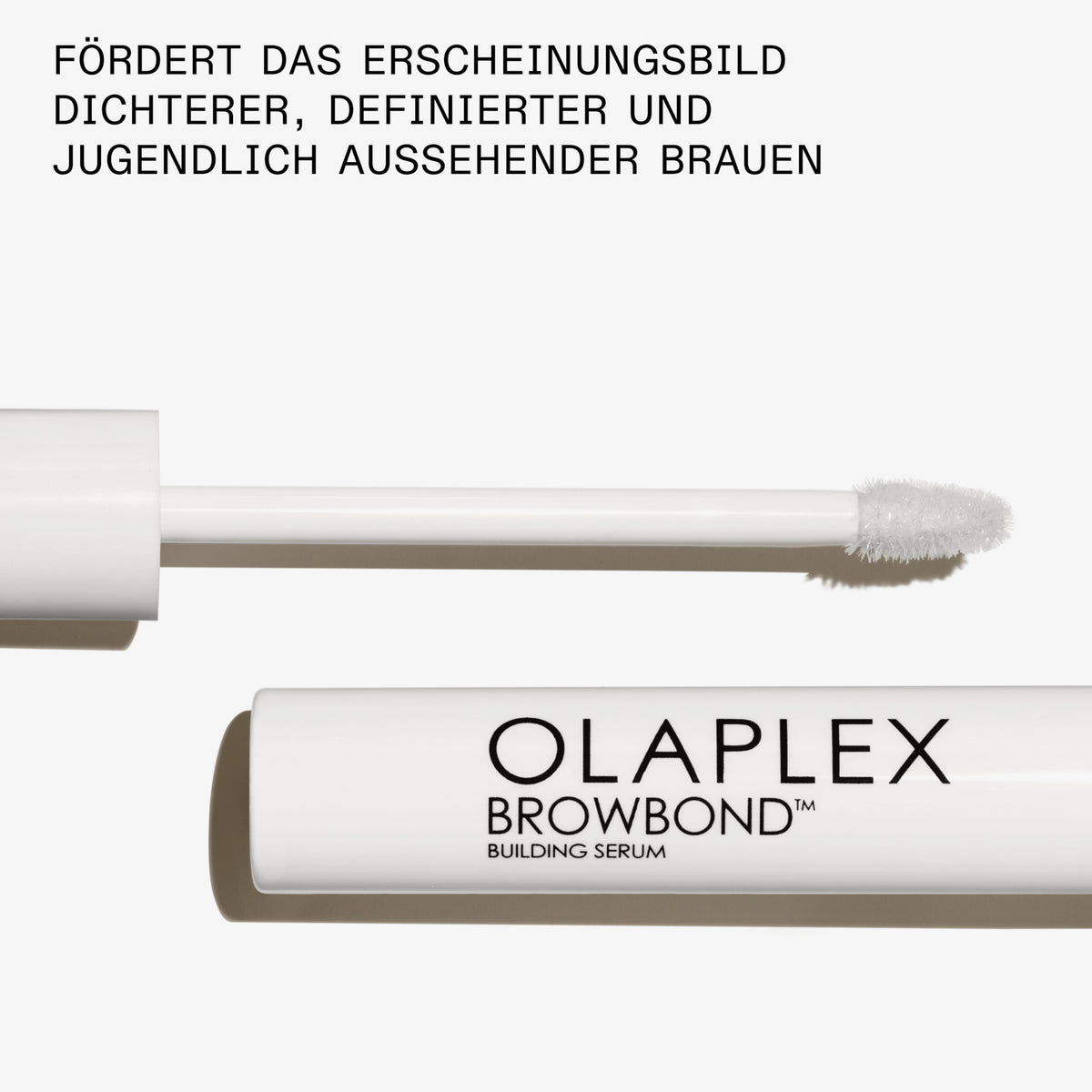 Offene Tube OLAPLEX Browbond Building Serum™; darüber Produktvorteile.