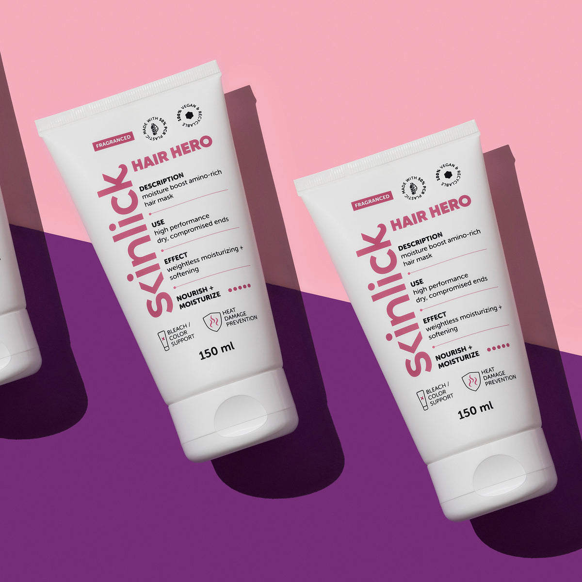 Drei Tuben Hair Hero-Creme werden auf einem rosa und violetten Hintergrund mit sichtbaren Schatten präsentiert.