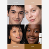 Vier Models mit unterschiedlichen Hauttönen – „Mineral“, „Light“, „Medium“ und „Dark“ – präsentieren die getönte Sonnencreme „Mineral Tinted Sunscreen“ von Transparent Lab vor farbigen Hintergründen.
