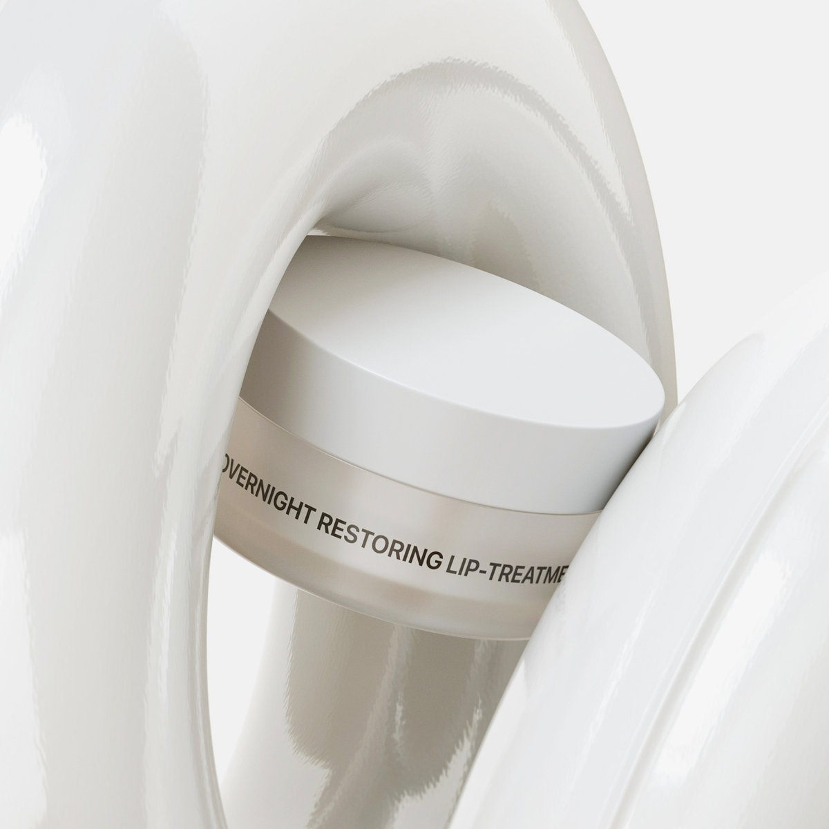 Schwebendes Overnight Restoring Lip-Treatment in einem Creme-Swirl.