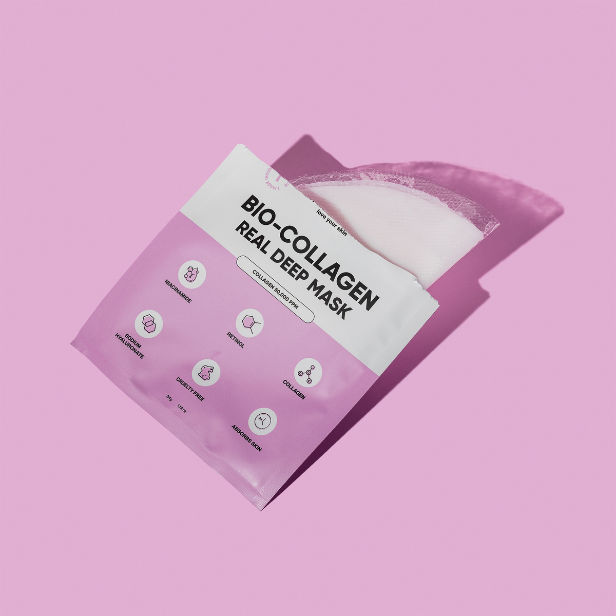 Eine weiße Breakout+Aid Bio-Collagen Deep Mask-Packung mit rosa Details und Symbolen für Inhaltsstoffe wie Kollagen, Niacinamid und Retinol.