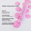 Eine rosafarbene Tube Lumene Lip Glow Oil Balm SPF30 mit rosafarbenen Tropfen neben einem Text, der den LSF, die Vorteile und die Eigenschaften auflistet.