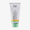 Tube der Celebrate Tøday All-In Barrier Cream mit pastellfarbenen Streifen und mintgrüner Kappe auf weißem Hintergrund.