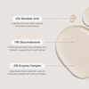 Transparent Lab Strong Exfoliator enthält 5% Mandelsäure, 3% Gluconolacton und 2% Enzymkomplex auf beigen Tropfen.