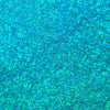 Nahaufnahme der Textur des des Opal Moonstone Loose Multichrome Eyeshadow Clever Clogs; ein türkis schimmerndes Pigment.