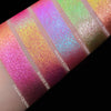 Mehrere bunte Muster des Opal Moonstone Loose Multichrome Eyeshadow auf einem Arm.