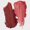 Zwei Tupfer LH Cosmetics Artistick Blush, ein dunkles Braun und ein schimmerndes Rosa, auf weißem Grund.