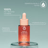Tropfflasche der maria nila Head & Hair Heal Soothing Serum mit einem Text über die Vorteile auf einem blaugrünen Hintergrund.