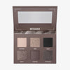 Die offene Mesauda Beauty Bare Harmony 2.0 Lidschattenpalette enthält sechs neutrale Farbtöne und die Bezeichnungen darunter.