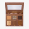 Die offene Mesauda Beauty Bare Harmony 2.0 Lidschattenpalette enthält sechs Farbtöne in matten und schimmernden Finishes und einen Spiegel im Deckel.