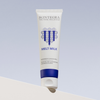 Eine Reinigungsmilch-Tube aus dem Winter Collagen Bank-Set mit blauem geometrischem Grafikdesign und Schriftzug.