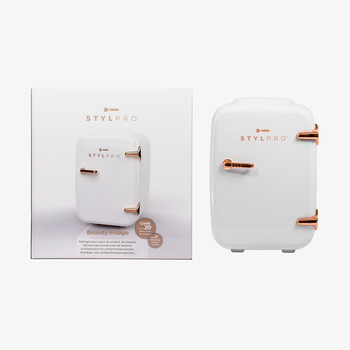 Neben der Verpackungsbox steht ein StylPro Beauty Fridge in Weiß und Roségold.
