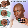 Person mit dunklem Teint hält Lightwork Freedom Mini Palette Pastel Dream; daneben Infos zu verwendeten Danessa Myricks Beauty Produkten.
