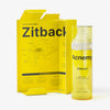 Das Zitback Spray neben geöffneter Verpackung vor weißem Hintergrund