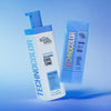 Technocolor Self Tanning Face Serum und Self Tanning Foam vor blauem Hintergrund mit Farbverlauf.