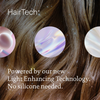 Braunes Haar mit drei schillernden Kreisen und Text, der Vorteile des High-Shine Gloss von Living Proof hervorhebt – eine silikonfreie Formel, die die Lichtreflexion des Haares verbessert.