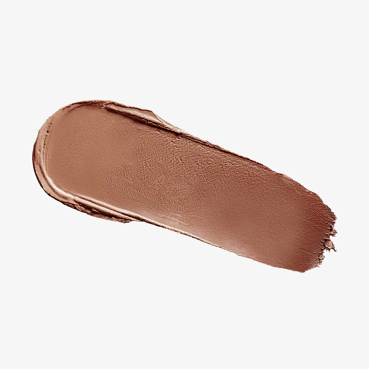 Ein Abstrich des cremigen Blush & Bronzer von Mesauda Beauty auf einem weißen Hintergrund verschmiert.
