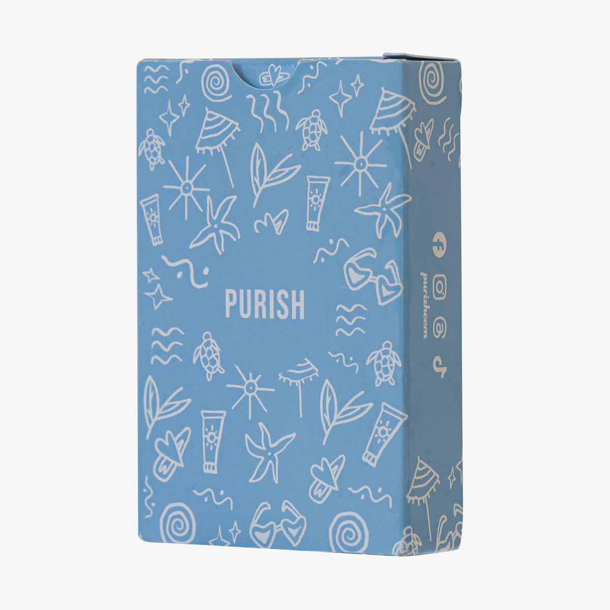 Blaue Verpackung des PURISH-Kartenspiels mit weißen Sommer-Illustrationen wie Sonnen, Muscheln und Sonnencreme, aufrecht vor weißem Hintergrund.