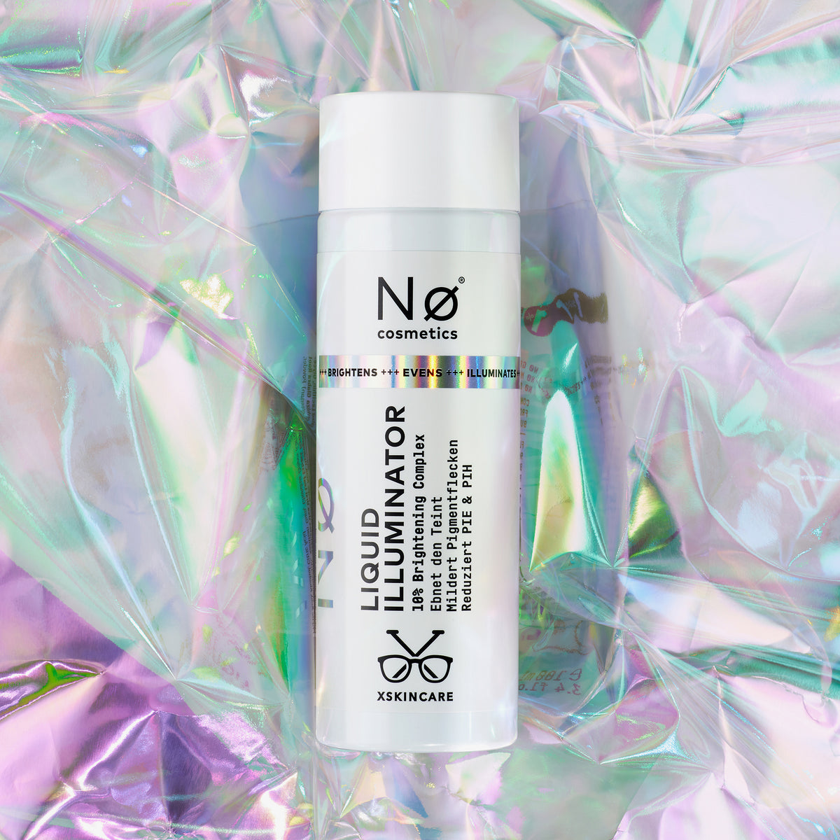 Eine Flasche strahlender tøday Liquid Illuminator liegt auf einem schillernden, pastellfarbenen Hintergrund.