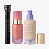 Drei NABLA-Produkte: schwarze Mascara mit Katzenkopf, rosa Angel Aura Serum-Primer und Skin Realist Tinted Balm in der Farbe 0.5 Fair mit lilafarbenem Pumpspender.