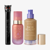 Drei NABLA-Produkte: schwarze Mascara mit Katzenkopf, rosa Angel Aura Serum-Primer und Skin Realist Tinted Balm in der Farbe 4 Medium-Tan mit lilafarbenem Pumpspender.