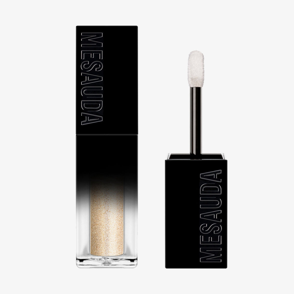 Der Galactic Shadow Flüssigliedschatten von Mesauda Beauty in einer rechteckigen Tube mit dem Deckel und Applikator daneben.