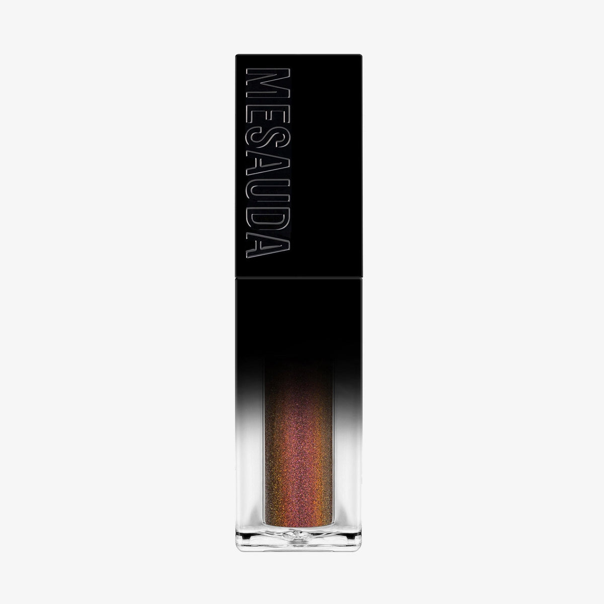 Der Galactic Shadow Flüssigliedschatten von Mesauda Beauty in einer rechteckigen Tube mit dem Mesauda-Label auf einer schwarzen Kappe.
