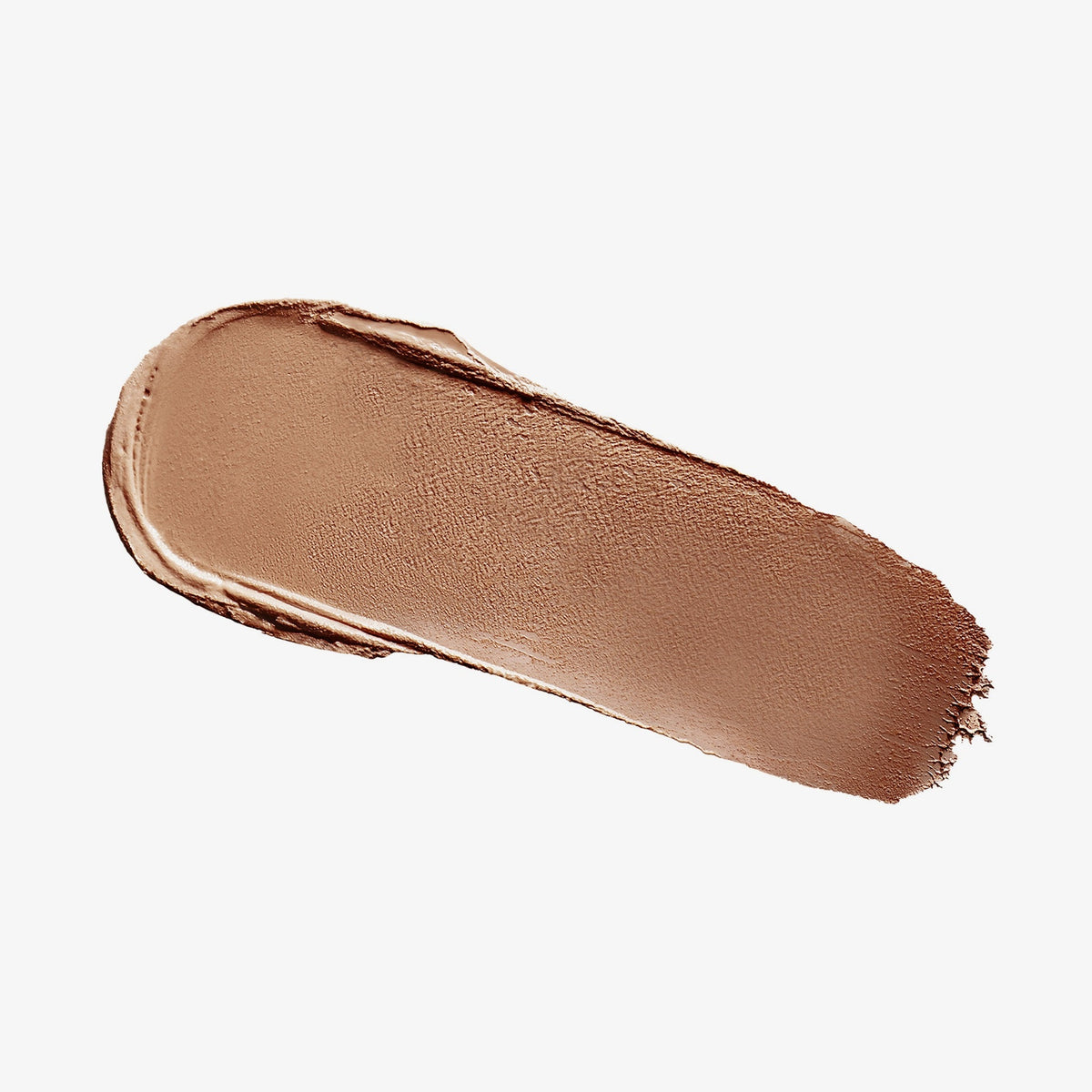 Ein Abstrich des cremigen Blush & Bronzer von Mesauda Beauty auf einem weißen Hintergrund verschmiert.
