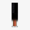 Der Galactic Shadow Flüssigliedschatten von Mesauda Beauty in einer rechteckigen Tube mit dem Mesauda-Label auf einer schwarzen Kappe.
