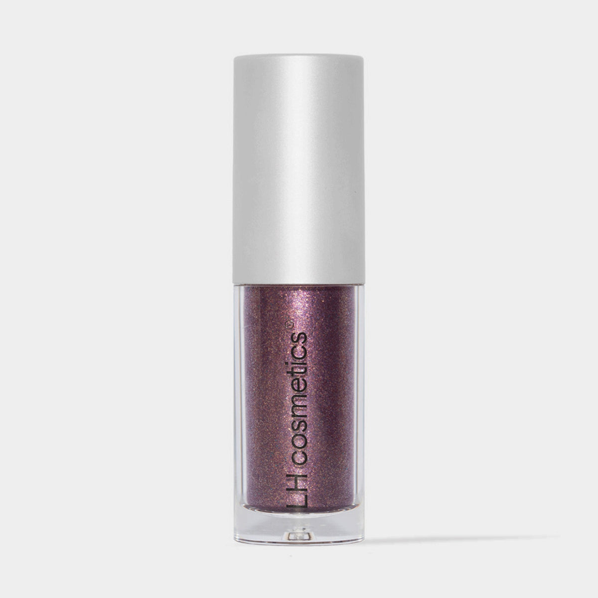 Transparente Tube Sparkl von LH Cosmetics mit weißer Kappe und lila schimmerndem Farbton namens Magic.